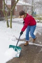Woman Shoveling Winter Snow