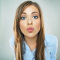 Woman show kiss lips, face portrait of business woman. funny fa