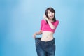 Woman show weight loss Royalty Free Stock Photo