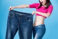 Woman show weight loss Royalty Free Stock Photo