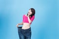 Woman show weight loss Royalty Free Stock Photo