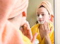 Woman after shower in bathroom mirror Royalty Free Stock Photo