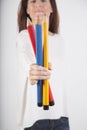 Woman showing big pencils Royalty Free Stock Photo