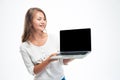 Woman showing blank laptop screen Royalty Free Stock Photo