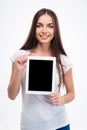 Woman showing blank tablet computer screen Royalty Free Stock Photo