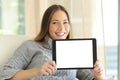 Woman showing blank tablet screen Royalty Free Stock Photo