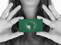 Woman showing a business card - African Union