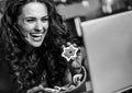 Woman showing christmas cookies while having video Royalty Free Stock Photo