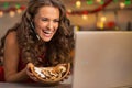 Woman showing cookies and having video chat Royalty Free Stock Photo