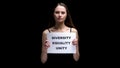 Woman showing diversity equality unity sign, multicultural relations, no racism Royalty Free Stock Photo