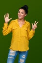 Woman showing eight fingers Royalty Free Stock Photo