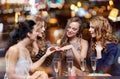 Woman showing engagement ring to her friends Royalty Free Stock Photo