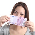 Woman showing a five hundred euros banknote