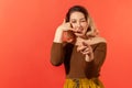 Woman showing a gesture of a phone and ask for call her Royalty Free Stock Photo