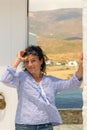 Woman showing the Greek beauty of Andros island.