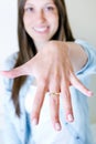 Woman showing her engagement ring at the camera Royalty Free Stock Photo