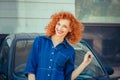 Woman showing her new car key smiling happy Royalty Free Stock Photo