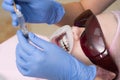 Woman showing her perfect straight white teeth. Close-up portrait of a female patient visiting dentist for teeth Royalty Free Stock Photo