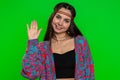 Woman showing inviting gesture with hands, ask to join, beckoning to coming, gesturing hello goodbye