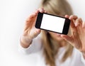 Woman showing mobile phone with empty display Royalty Free Stock Photo