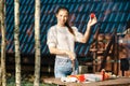 Woman showing off tomatoes grown in her country house