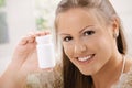 Woman showing pill bottle Royalty Free Stock Photo