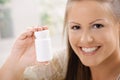 Woman showing pill bottle Royalty Free Stock Photo