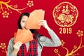 woman showing red envelopes for chinese new year.chinese t Royalty Free Stock Photo