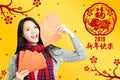 woman showing red envelopes for chinese new year.chinese t Royalty Free Stock Photo