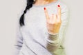 Woman showing rock sign Royalty Free Stock Photo