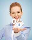 Woman showing sign of percent in her hand Royalty Free Stock Photo