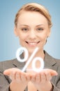 Woman showing sign of percent in her hands Royalty Free Stock Photo