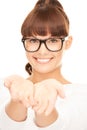 Woman showing something on the palms of her hands Royalty Free Stock Photo