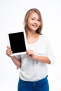 Woman showing tablet computer screen Royalty Free Stock Photo