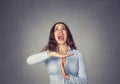 Woman showing time out hand gesture, screaming to stop it Royalty Free Stock Photo