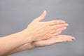 Woman showing word stop on grey background. Sign language Royalty Free Stock Photo