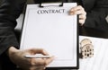 The woman shows CONTRACT Business concept. White blank sheet of paper Royalty Free Stock Photo