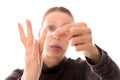 Woman shows her sticky hands with cobwebby fingers, isolated on