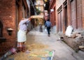 Woman Sifting Chaff from the Rice Royalty Free Stock Photo