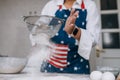 Woman sifting flour through sieve. Selective focus. Royalty Free Stock Photo