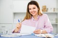 Woman is signing profitable financial agreement Royalty Free Stock Photo