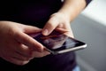 Woman signs up for banking with their mobile