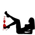 Woman silhouette on the back with red bra hanging on her leg