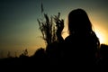 Woman silhouette with bouquet of flowers Royalty Free Stock Photo