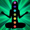 Woman silhouette with chakras on here body. EPS8 Royalty Free Stock Photo