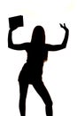 Woman silhouette holding up one book Royalty Free Stock Photo