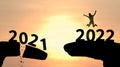 Woman silhouette jumping on 2022 numbers. Happy new year 2022. Celebration concept. Enjoy Happy Royalty Free Stock Photo