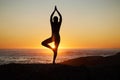 Woman, silhouette or sunset yoga on beach by ocean, sea or water horizon for mental health, relax exercise or sun Royalty Free Stock Photo