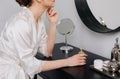 Woman silk robe dressing room mirror accessories Royalty Free Stock Photo