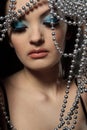 Woman with silver beads Royalty Free Stock Photo